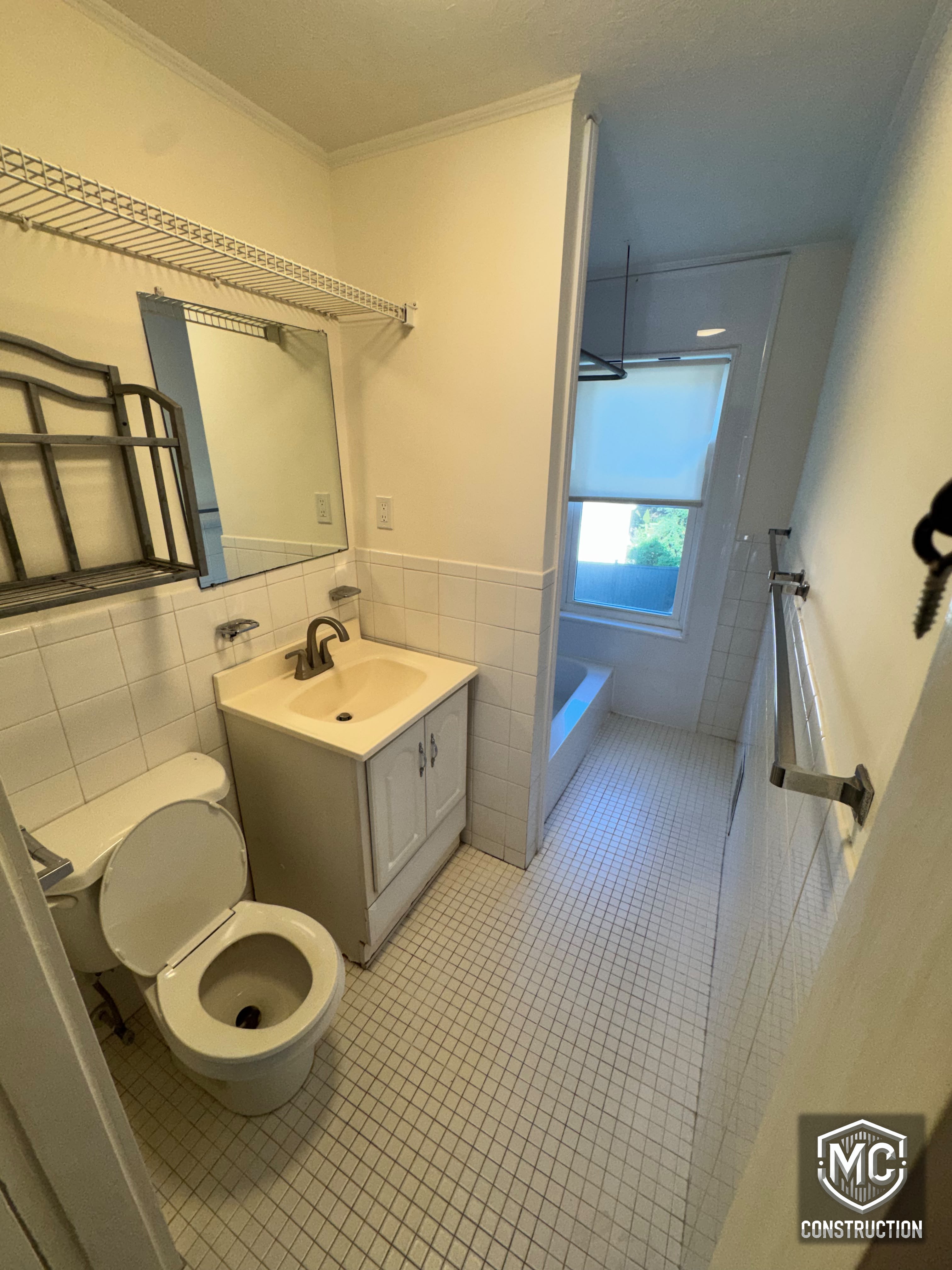Dated bathroom before renovation in Natick, MA
