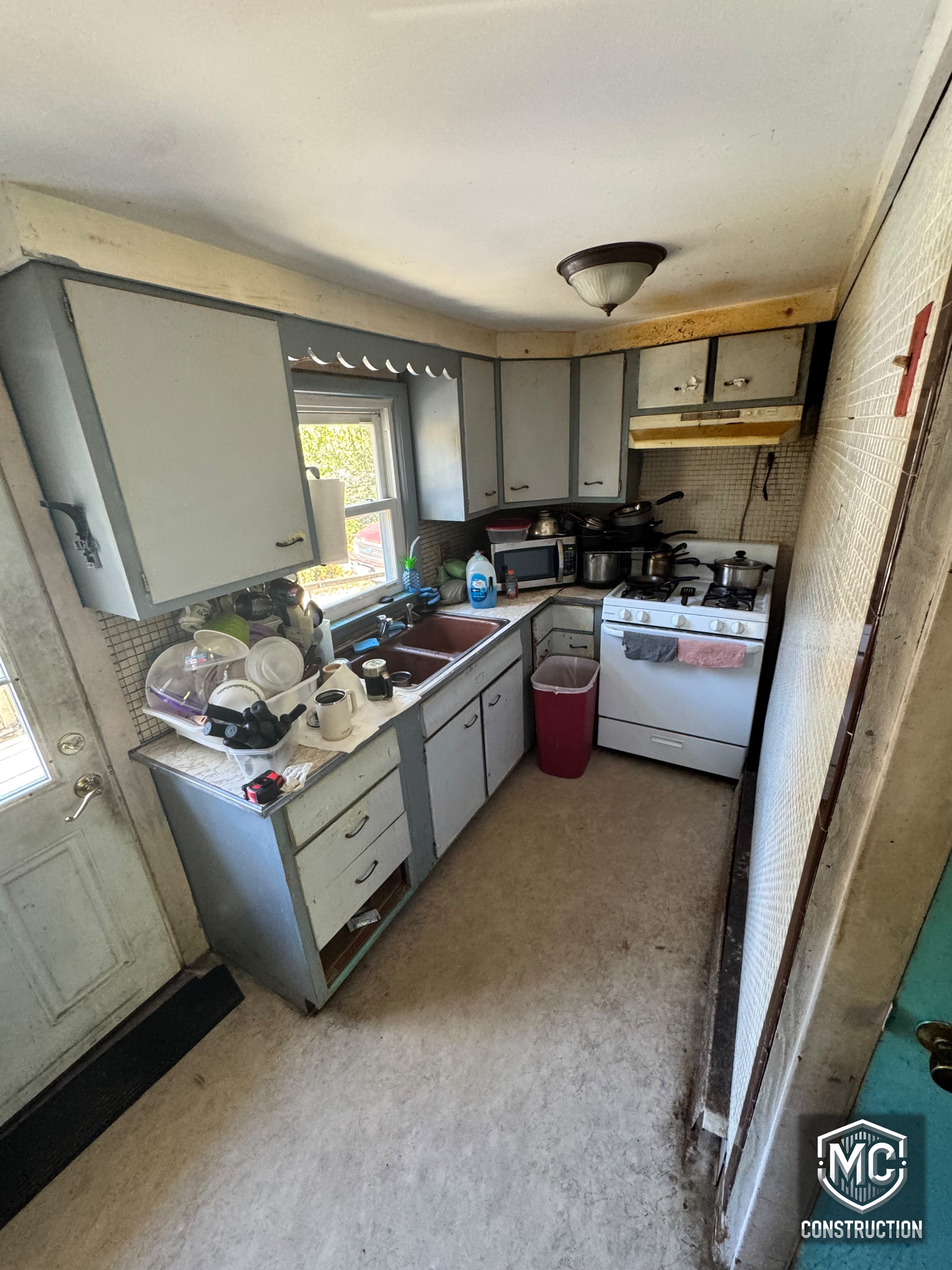 Dated kitchen before renovation by MC Construction and Improvement in Boylston, MA