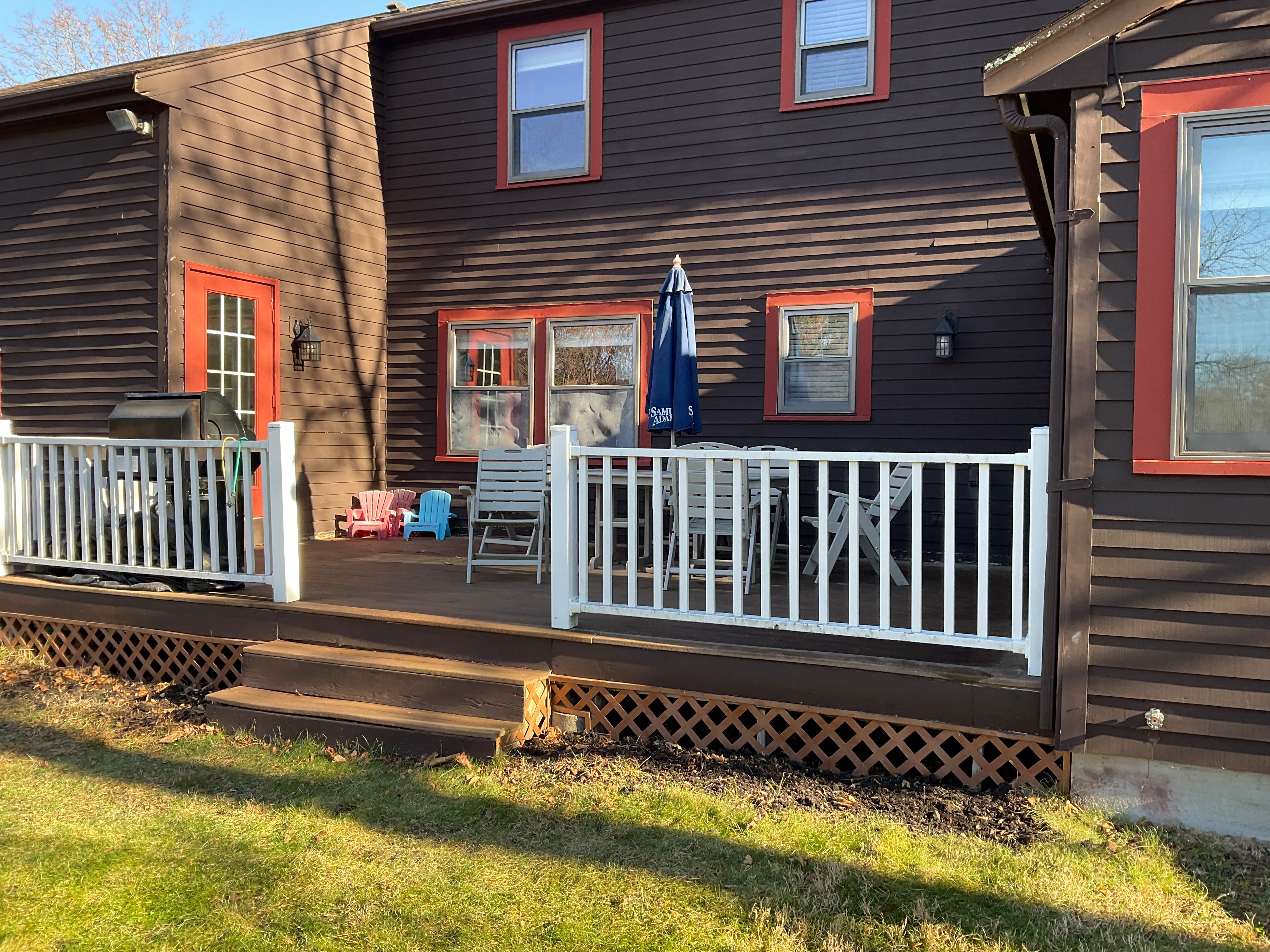 Old wood deck before a full replacement by MC Construction and Improvement